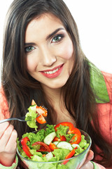 Young woman eat salad. Healthy vegetarian food.