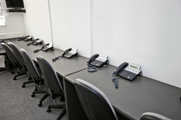 Chairs and landline telephones in television station