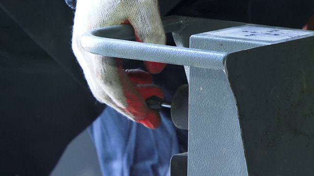 Engineer working with  machines at a factory