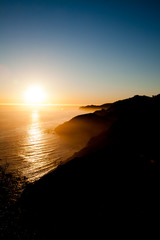 A sunset on Highway 1, Big Sur in California