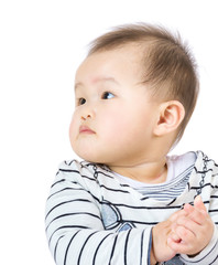 Little boy looking at a side isolated on white