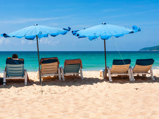 umbrellas and lounge chairs on the beach