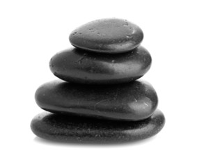 Growing piled up pebbles on a white background