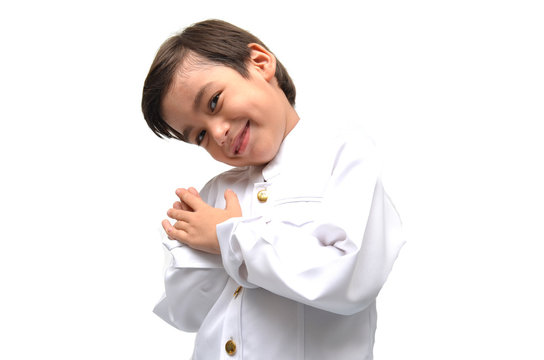Little boy on Thai costume on white background
