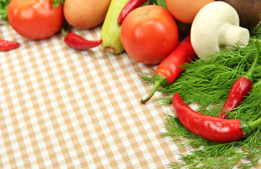 Cooking concept. Vegetables on tablecloth background