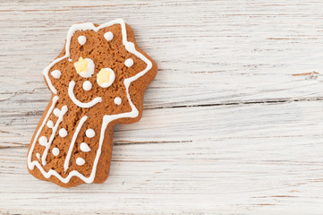 Christmas gingerbread comet on wooden background