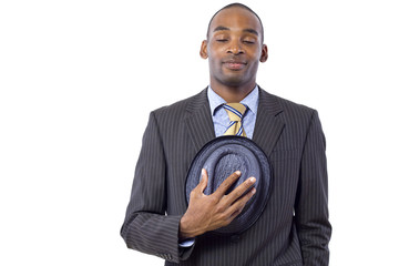 young black businessman being polite by taking hat off
