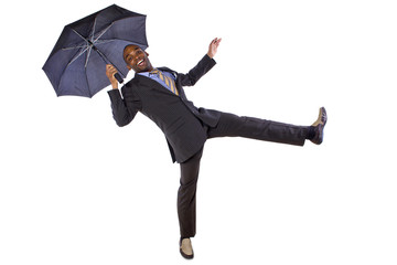 young black businessman dancing with an umbrella