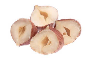 Close up of four half filbert.