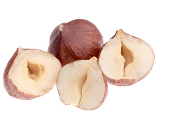 Close up of four half filbert.