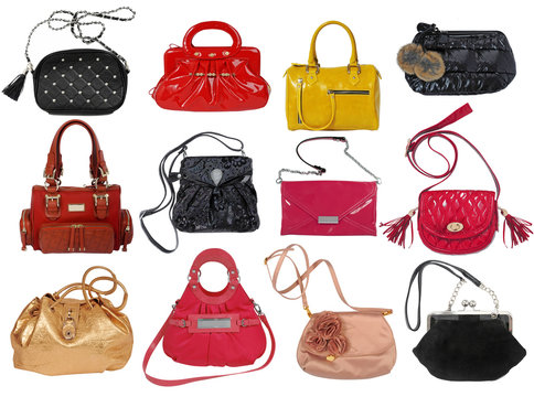 collection of women's handbags isolated on white