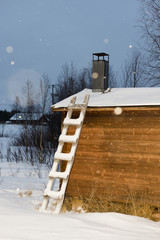 ladder on wooden hut lapland in winter