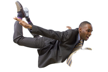 young african american businessman flying or skydiving