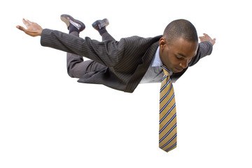 young african american businessman flying or skydiving
