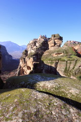 greek orthodox church and monastery on a pinnacle of rock in meteora	