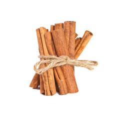 related cinnamon sticks on white background