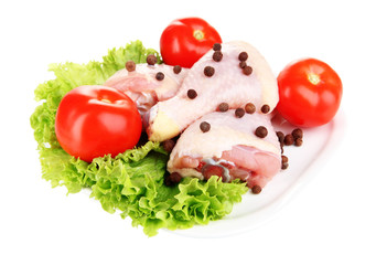 Raw chicken legs isolated on white
