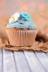 Tasty cupcake with butter cream,