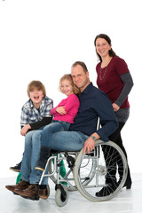 Fototapeta na wymiar man in wheelchair with family