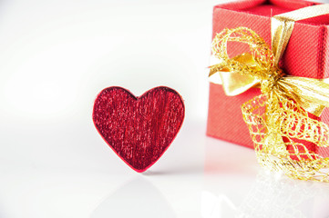 heart and gift on white