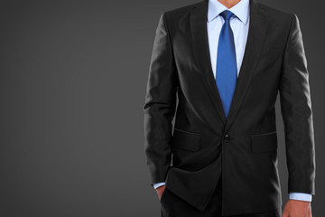 man in suit on a black background