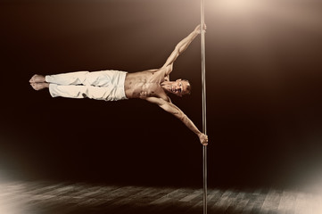 strong male pole dance