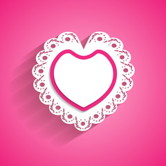 pink background with a paper lacy heart frame