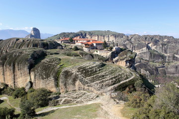 greek orthodox church and monastery on a pinnacle of rock in meteora	