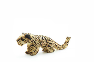 mini figure of wood of a leopard isolated on white background