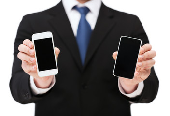 businessman showing smartphones with blank screens
