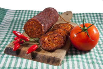 Hungarian homemade paprika salami with vegetables