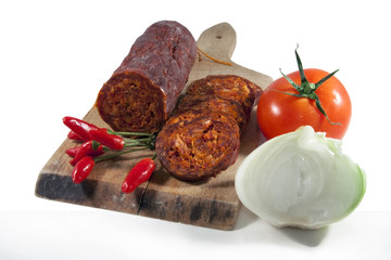 Hungarian homemade paprika salami with vegetables