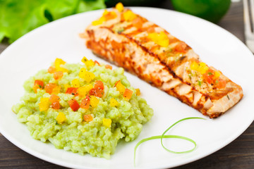 Creamy avocado rice with grilled salmon