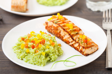Creamy avocado rice with grilled salmon