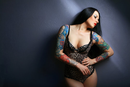pretty young girl with tattoo