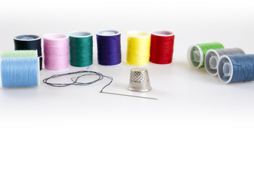 needle, thimble and bobbin