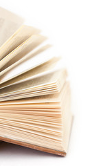 Detail of open book on white background