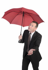 Geschäftsmann mit Schirm