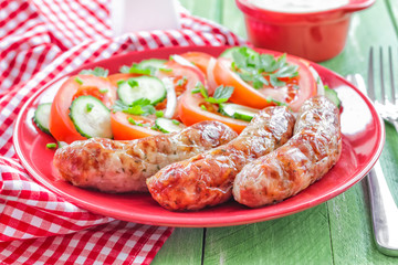 Sausages and salad