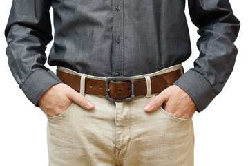 man with hands in pockets