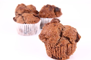 Chocolate muffins on a white background