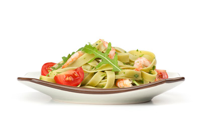 Pasta tagliatelle with shrimp and arugula
