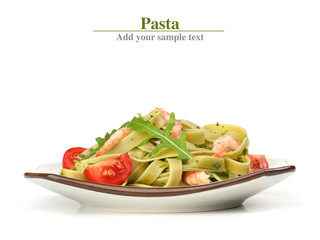 Pasta tagliatelle with shrimp and arugula