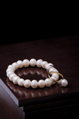 Ring with pearl and pearl bracelet