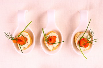 Smoked salmon roll on white bread and remoulade