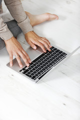 Fototapeta na wymiar Woman typing on keyboard