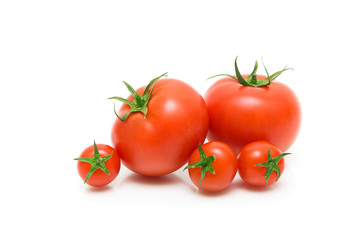 ripe tomatoes on a white background closeup