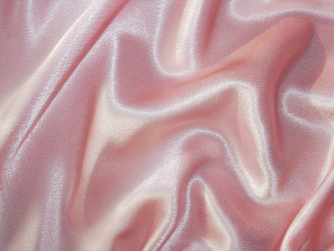 Draped pink satin - fabric background