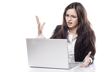 young business woman in a hopeless situation on her laptop