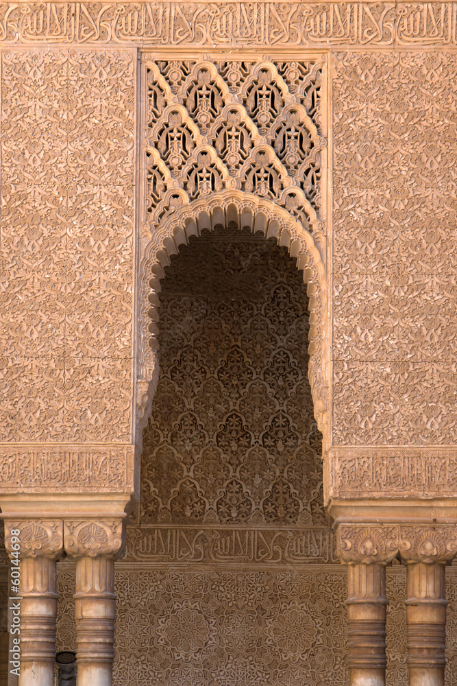 Wall mural Moorish arches and columns of Alhambra harem in Granada, Spain